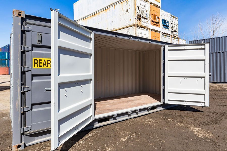6-Meter-Container mit offenen Seiten, neuwertig.