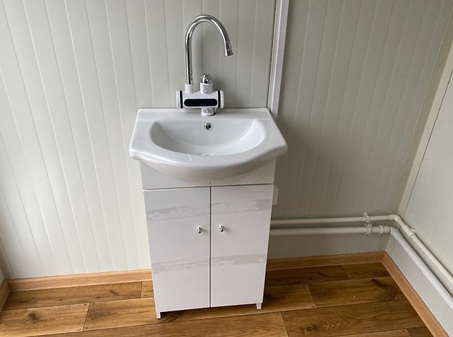 Doppelkabinen-Toilette