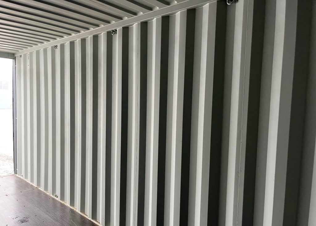 6-Meter-Container mit Rolltor und Eingangstür RAL 7016