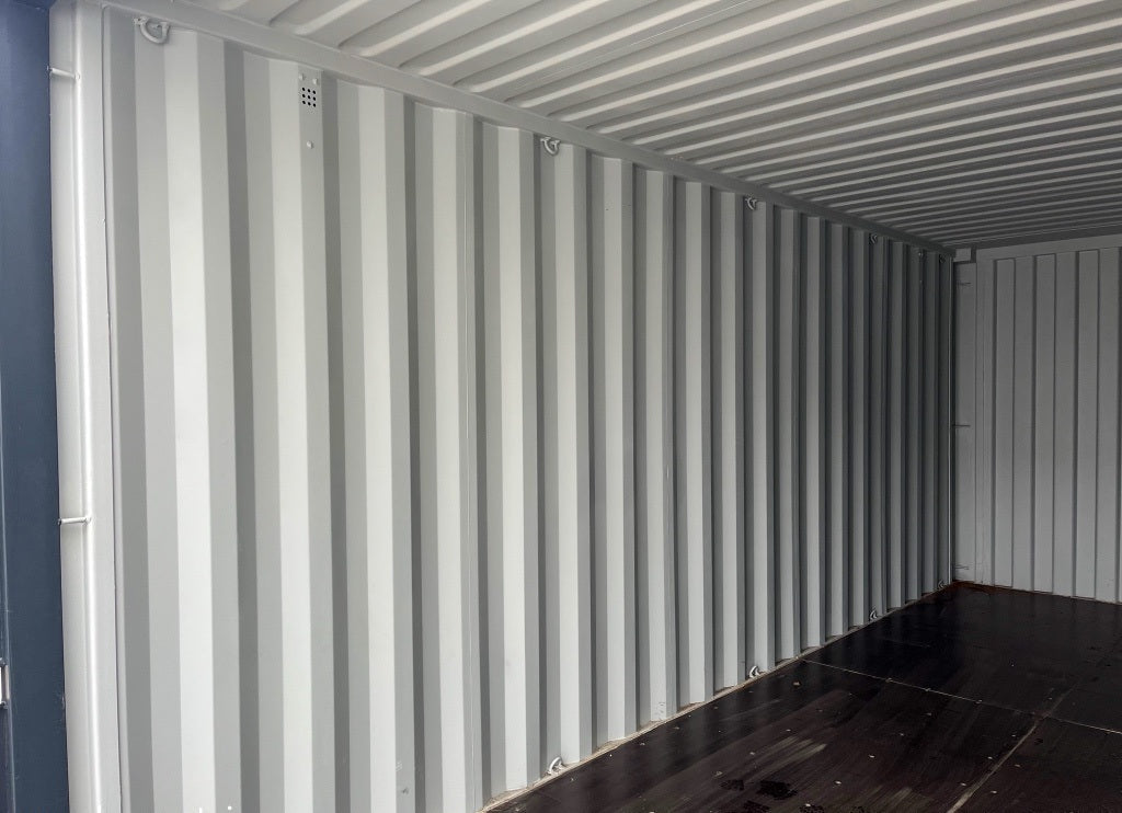 6-Meter-Container mit Rolltor und Eingangstür RAL 7016