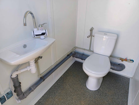 DOPPELTER SANITÄRCONTAINER MIT 2 KABINEN 245x173x229