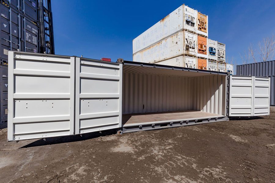 6-Meter-Container mit offenen Seiten, neuwertig.